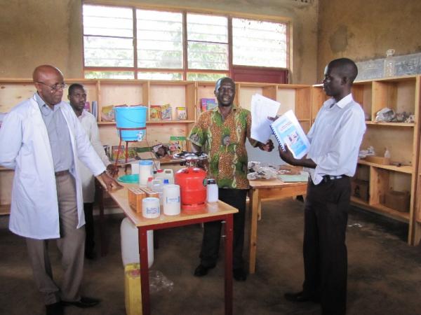 Delivery of lab materials to Nyagatoma Principal